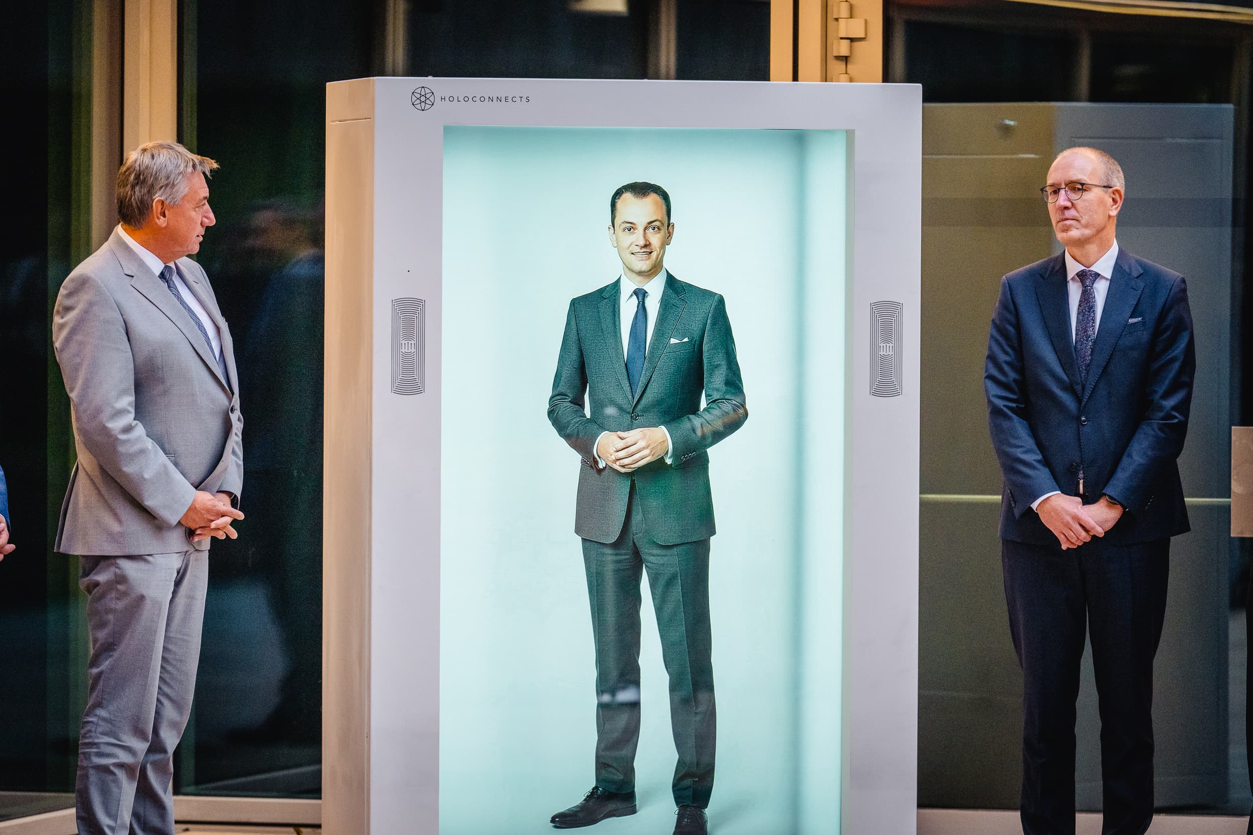 Digital Twin of Baron Léon Lambert appearing in a Holobox at the ING office opening in Brussels.